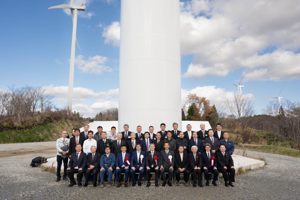 Vena Energy team at Nakasato Wind Project in Aomori Japan during commercial operation milestone ceremony